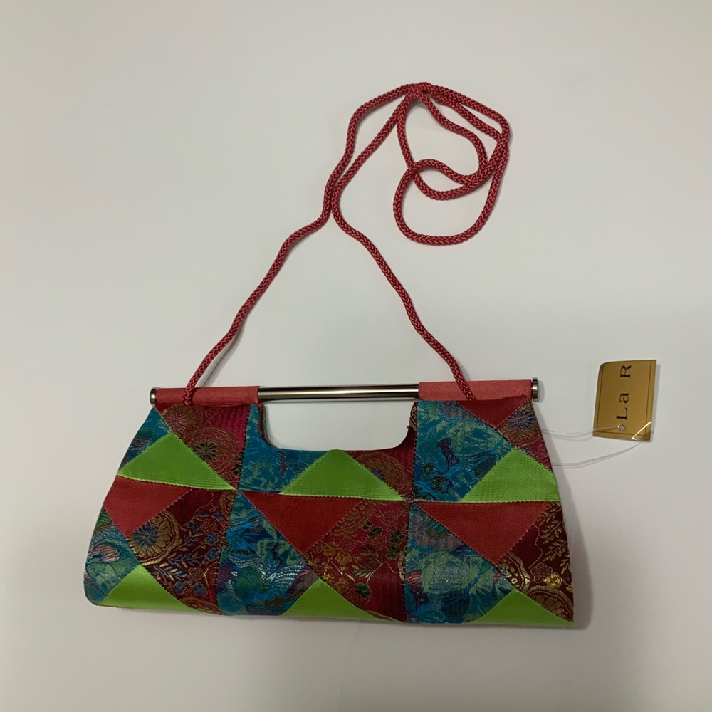 Beautiful Le Regale Clutch with Strap.